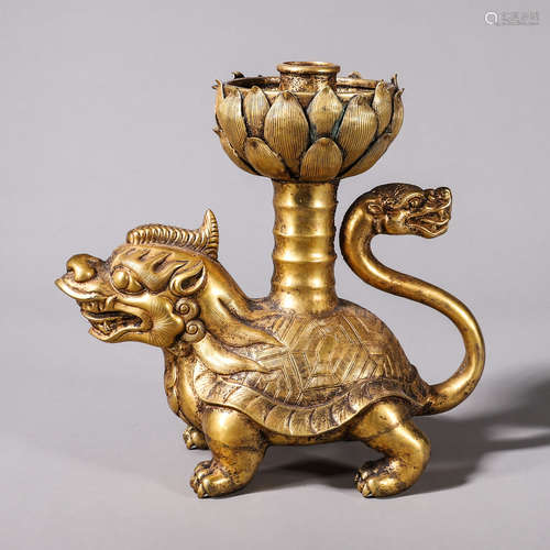 A gilding copper beast-shaped candlestick