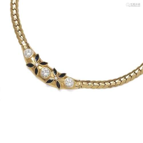 Collier en or jaune 18K (750/1000) à mailles anglaise, centr...