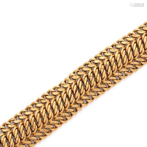 Bracelet en or jaune 18K (750/1000) à mailles américaines. F...