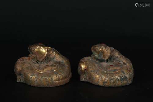 pair of chinese gilt bronze beasts