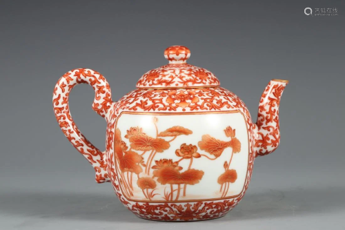 AN IRON RED 'INSCRIPTIONS AND LOTUS' TEAPOT