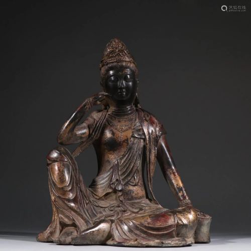 A GOLD-PAINTED BRONZE FIGURINE OF GUANYIN