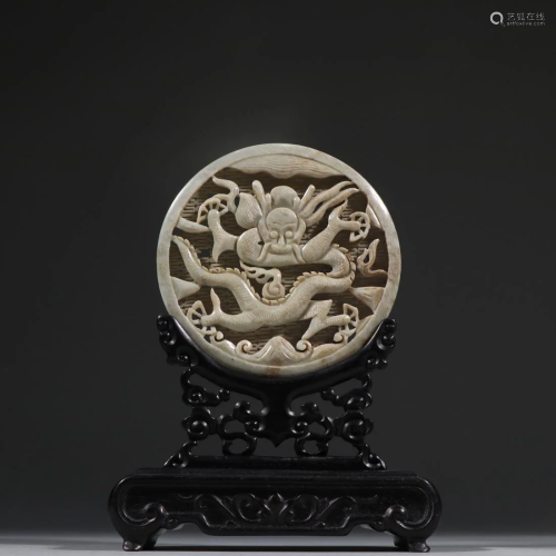 AN OPENWORK 'DRAGON' JADE CARVING TABLE SCREEN