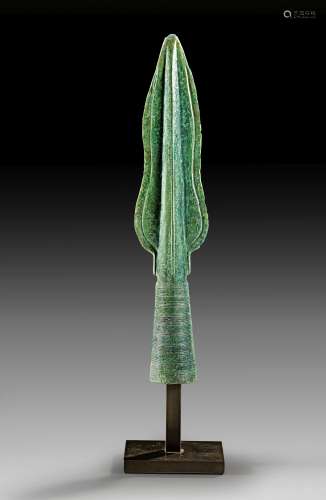 Lavishly decorated cast bronze spearhead with a lozenge-shap...