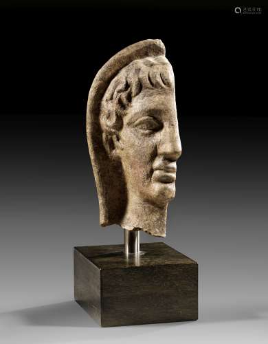 Terracotta votive head of a veiled youth.