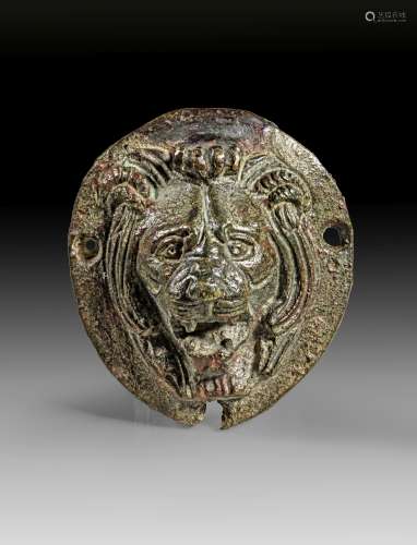 Bronze lion head relief in excellent style.