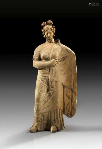 Terracotta of a draped woman.