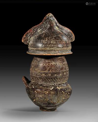 Villanova biconical urn with lid in form of a crested helmet...