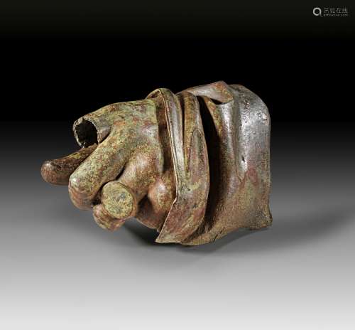 Fragment of an over life size roman bronze statue of a high ...