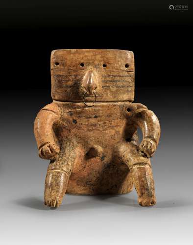 Quimbaya seated figure.