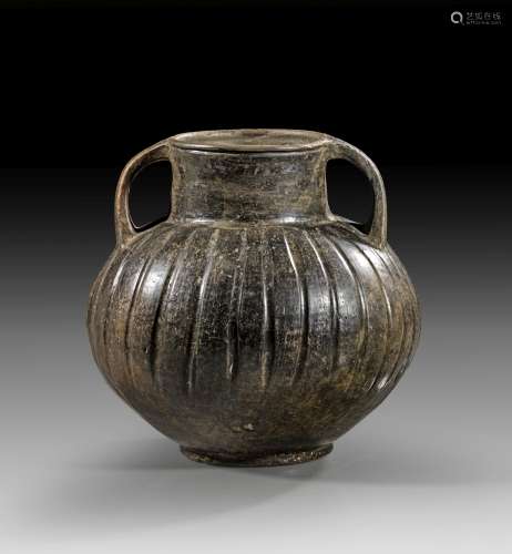 Early Etruscan ribbed amphora.