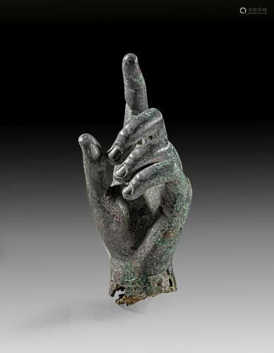 Fragment of an under life size roman bronze statue.