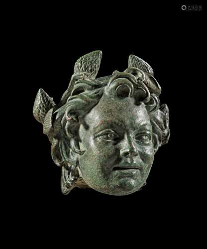 Roman steelyard weight in form of a satyr's head.