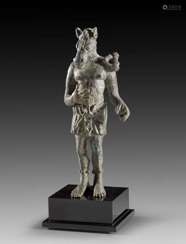 Bronze figure of a horse-headed demon wearing a short skirt.