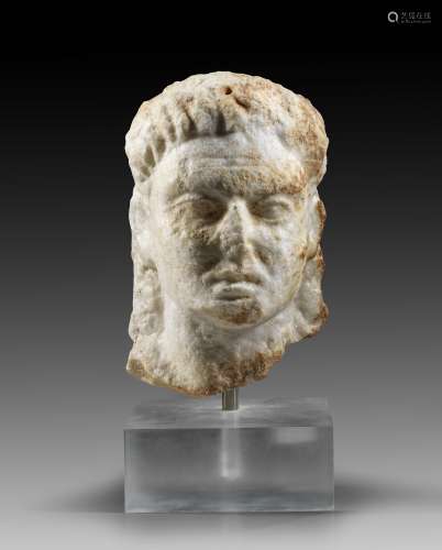 Marble relief head of a man.