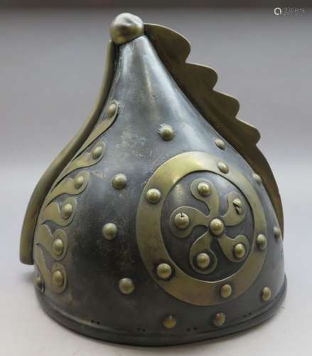 Ⓦ A BRASS-MOUNTED IRON HELMET^ 20TH CENTURY^ PROBABLY FOR TH...