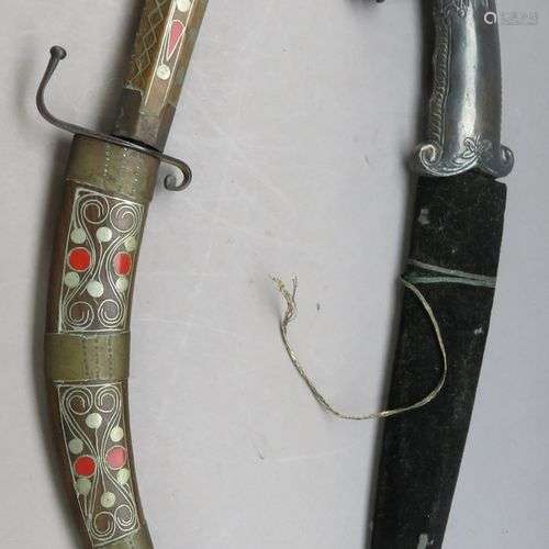 AN INDIAN DAGGER (KHANJAR) AND A NORTH AFRICAN DAGGER^ 20TH ...