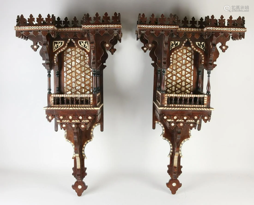 Two North African wooden wall consoles with bone inlay