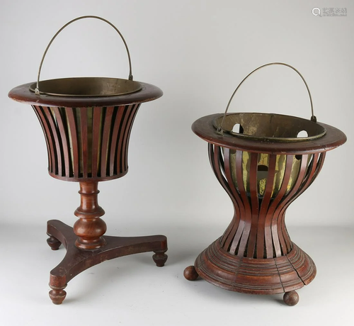 Two 19th century mahogany tea stoves. One with brass