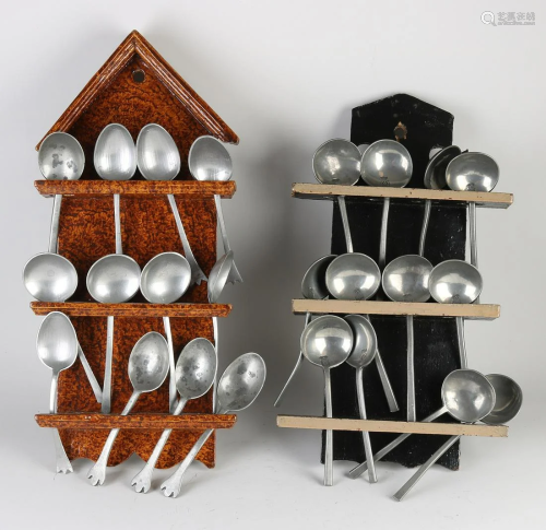Two antique spoon racks with pewter spoons. Dimensions: