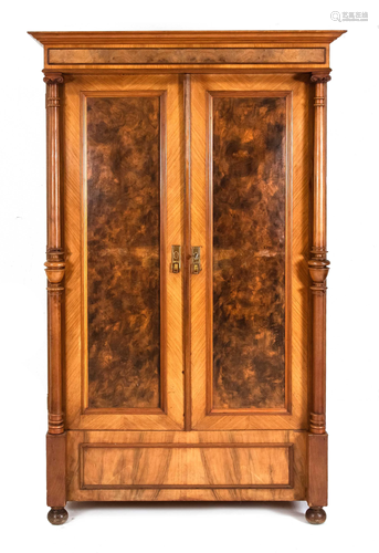 Walnut cabinet with columns. Circa 1880. Panels with