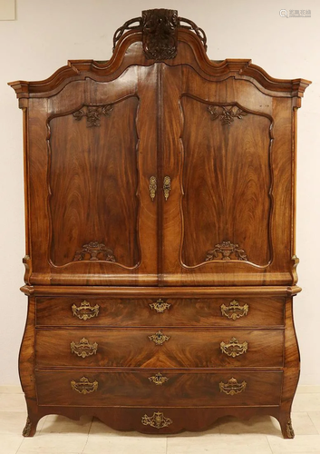 Large Dutch mahogany bombed linen cabinet with