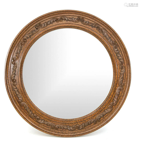 Large round wood-carved mirror with polychrome. After