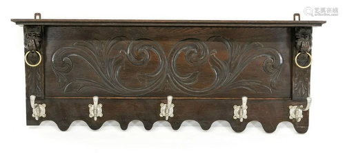 Dutch oak coat rack with lion heads. Neo-Renaissance.