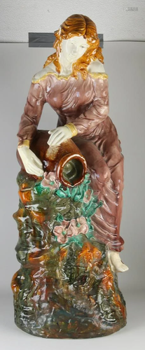 Large majolica statue. 20th century. Woman with