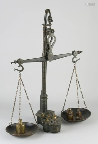 Old brass scales with antique weights. Dimensions