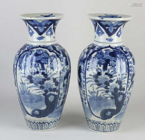 Two Japanese porcelain Imari vases with garden/bird of