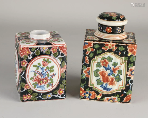 Two Dutch Makkumer porcelain tea canisters. Marked