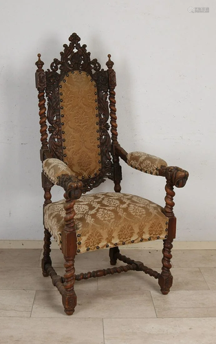 19th century oak armchair with lion heads and twisted