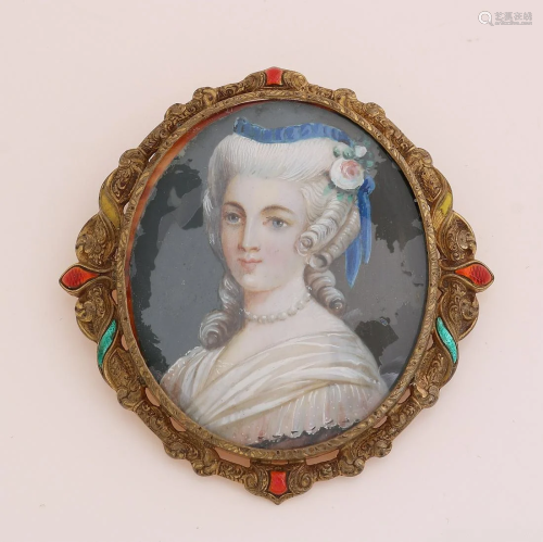 Antique gold plated brooch with miniature portrait.