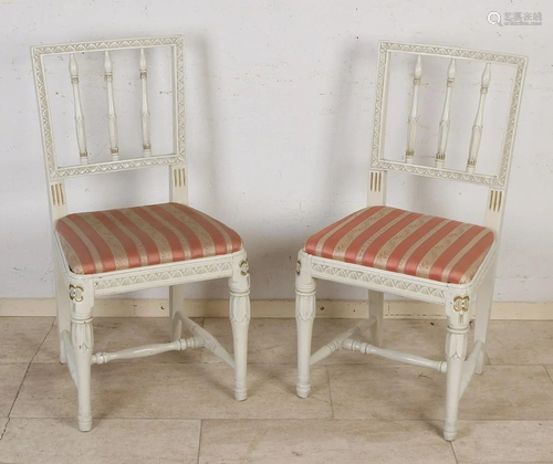 Four white-painted Louis Seize chairs from the 18th