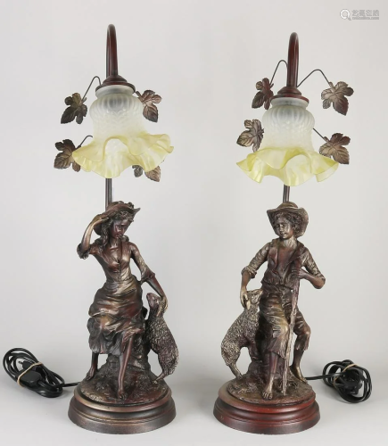 Two composite table lamps. Woman with sheep + man with