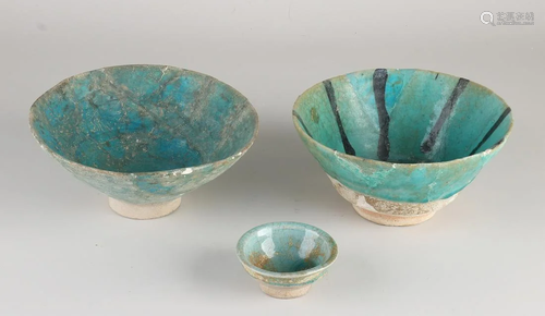 Three antique glazed terracotta Nishapur bowls. Iran.