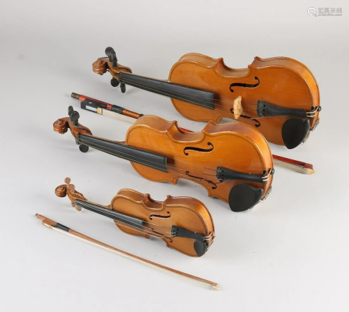 Three decorative miniature violins. Second half of the