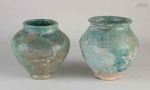 Two antique Iranian terracotta glazed Nishapur pots.