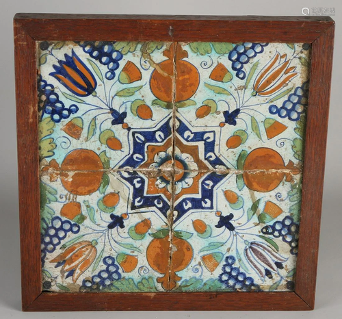 17th century Dutch tile tableau with floral decor.