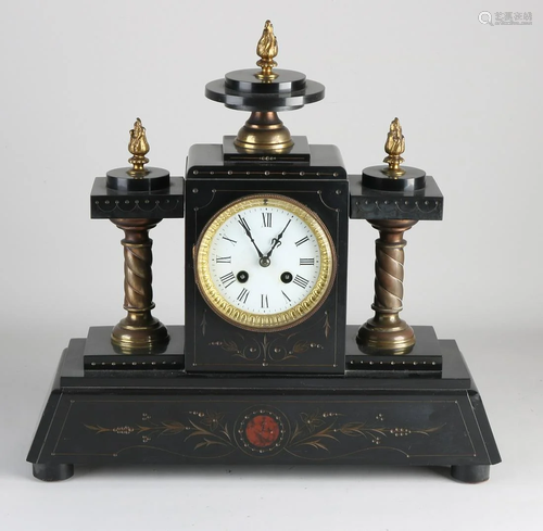 Antique black marble clock with engravings. Circa 1890.