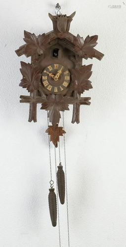 Two old antique cuckoo clocks with pendulum and