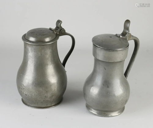 Two tin valve jugs. 18th - 19th century. One jug has