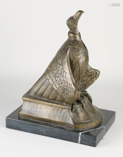 Bronze Art Deco style vulture on black marble base.