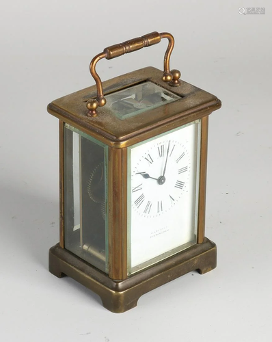 Antique French brass travel alarm clock. Marked R + C.