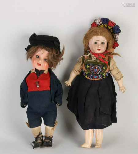 Two antique German dolls in traditional costume. 1x