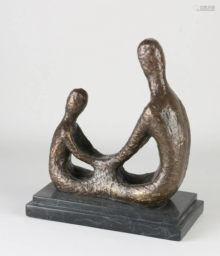 Modern bronze figure on black marble base. 21st