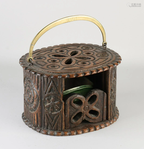 19th century carved oak stove with ceramic inner tray