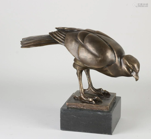 Bronze figure on black marble base. 21st century. Hawk.