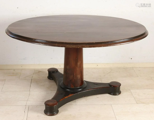 Old mahogany empire table. Circa 1820. Slight damage.